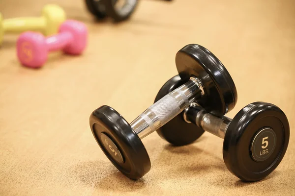 Sport equipment in fitness room or gym room, relax room for healthy people, Dumbbell in fitness and gym room. — Stock Photo, Image