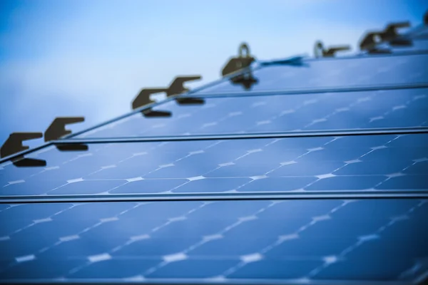 Solar Cell Generated Electrical Power by Sun Light, Closeup of Blue Photovoltaic Solar Panels, Green Energy for Safe World, Power Supply and Generated Electrical Power to Battery, — Stock Photo, Image