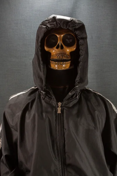 Human skull on a black background. Halloween day or Ghost festival, Ghost on suit. — Stock Photo, Image