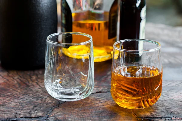 Golden Brown Whisky on the rocks in a glass — Stock Photo, Image