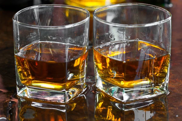 Golden Brown Whisky on the rocks in a glass — Stock Photo, Image