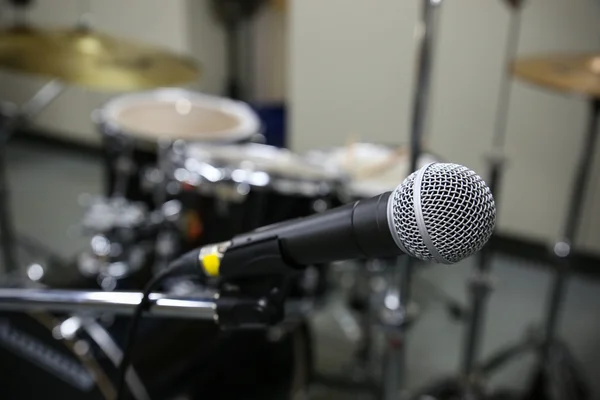 Close up of microphone in concert hall or conference room. Music equipment in training room. — Stock Photo, Image
