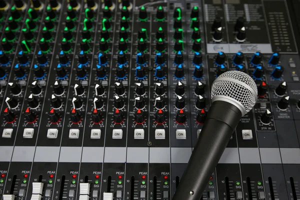 Hand on a Mixing Desk Fader in Television Gallery, Music equipment in training room. — Stock Photo, Image