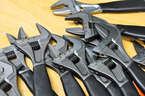 Set of hand tools on a wooden background, Wrench tools or Pipe wrench for hard work. — Stock Photo, Image