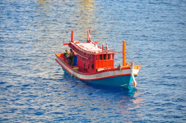 Tekne başlığı Körfez için sabahın erken saatlerinde Balık tutma