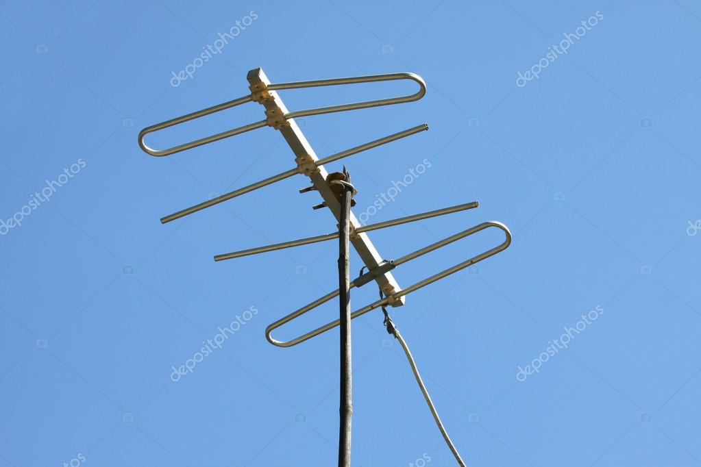 Old Tv Antenna On House Roof With Bule Sky Stock Photo C Curraheeshutter 6343
