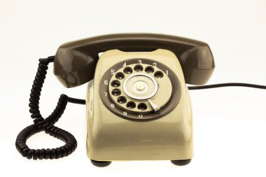 Beyaz arka plan üzerinde eski telefon ile yeni akıllı telefon Vintage resim stili. Yeni iletişim teknolojisi.