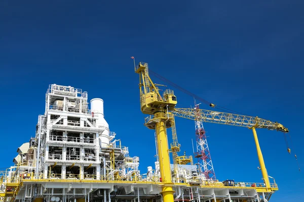 stock image Offshore oil and gas production and exploration business. Production oil and gas plant and main construction platform in the sea. Energy business.