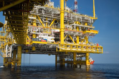 Deniz aşırı petrol ve doğalgaz üretimi ve keşif işi. Üretim petrol ve gaz fabrikası ve denizdeki ana inşaat platformu. Enerji sektörü.