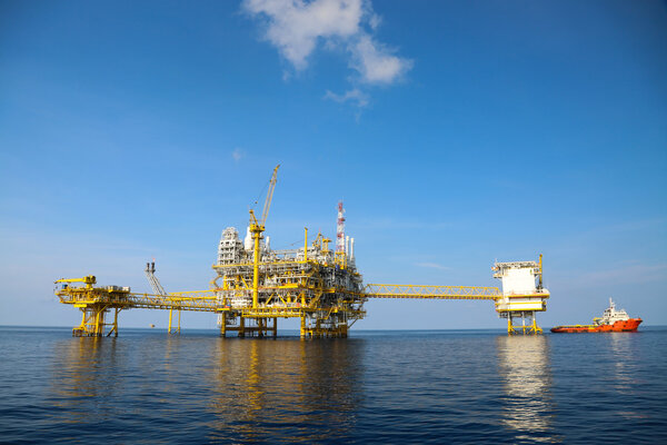 Offshore oil and gas production and exploration business. Production oil and gas plant and main construction platform in the sea. Energy business.