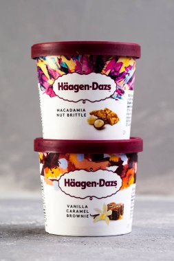 KIEV, UKRAINE - January 03, 2021: Haagen-Dazs ice cream with different flavors and new collection on gray background