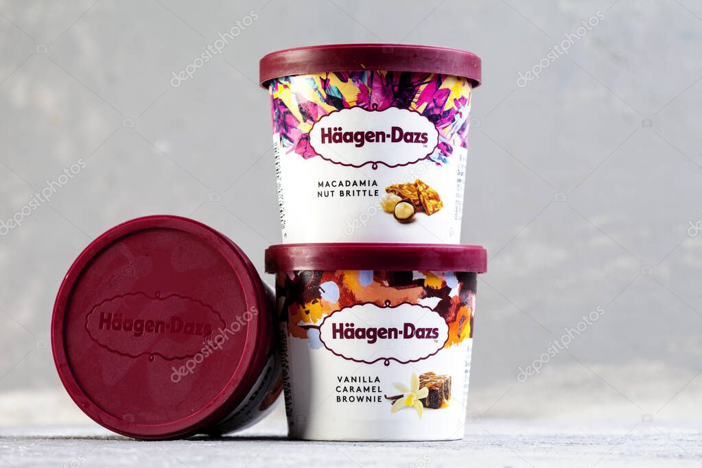 KIEV, UKRAINE - January 03, 2021: Haagen-Dazs ice cream with different flavors and new collection on gray background