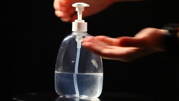 Woman push dispenser and liquid soap squeezed out to hand, — Stock Video