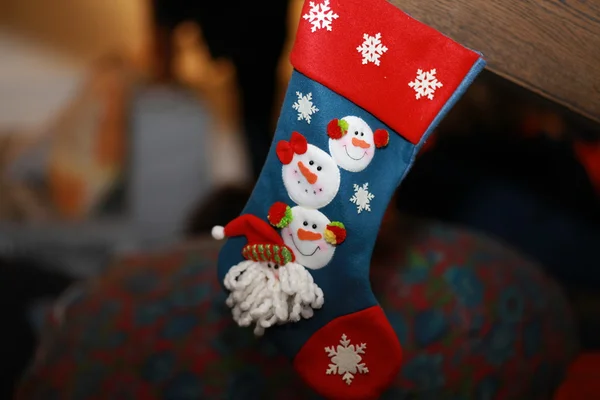 Christmas stocking with a picture of snowmen — Stock Photo, Image