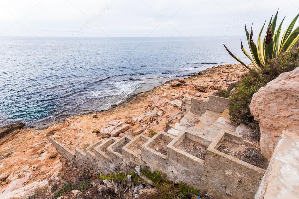 Spain coast, stairs  to sea water