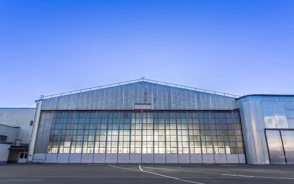 Large aircraft hangar for planes — Stock Image Large aircraft hangar for planes Stock Photo