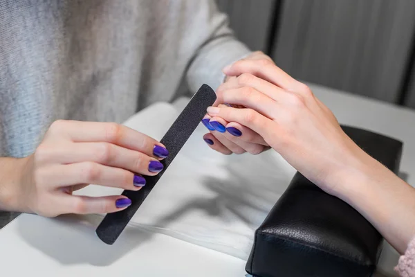 Picture of manicure process on female hands — Stockfoto