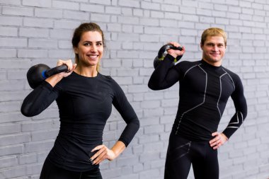 Man and girl in fitness gym clipart
