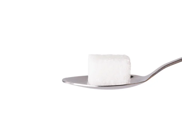 Salt or sugar on a teaspoon isolated — Stock Photo, Image