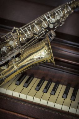 Old Saxophone Piano  clipart