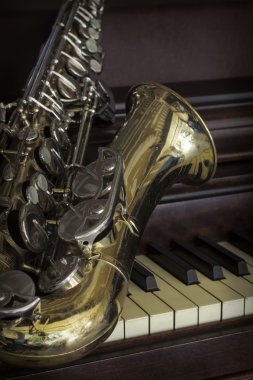 Old Saxophone Piano  clipart