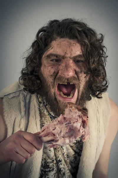 Realistic Caveman Eating — Stock Photo, Image