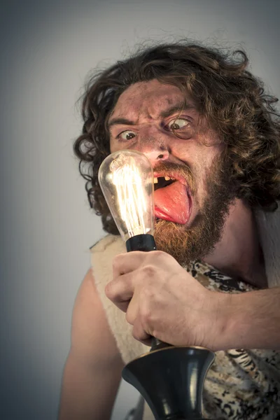 Caveman Lightbulb bodoh — Stok Foto