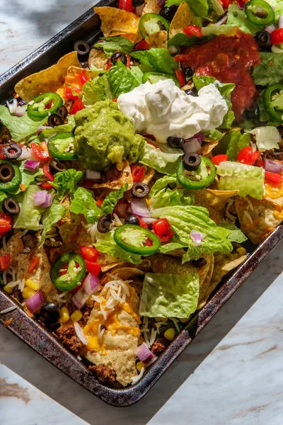 Loaded Toppings Beef Nachos Guacamole Sour Cream Tomato Salsa — Stock Photo, Image