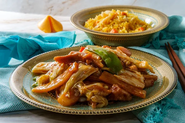 Chinese cuisine double cooked pork with cabbage and chicken fried rice