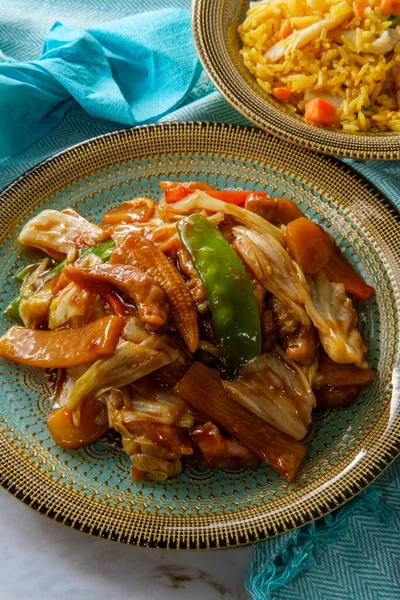 Chinese cuisine double cooked pork with cabbage and chicken fried rice