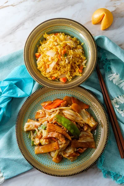 Chinese cuisine double cooked pork with cabbage and chicken fried rice
