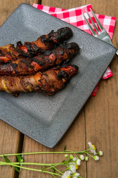 Bacon Wrapped Cheese Hot Dogs Roasted Campfire Picnic Table — Stock Photo, Image