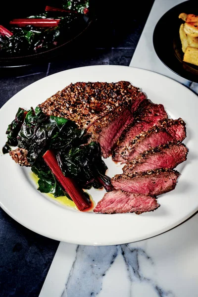 Rare Steak Everything Bagel Seasoning Served Red Swiss Chard — Stock Photo, Image