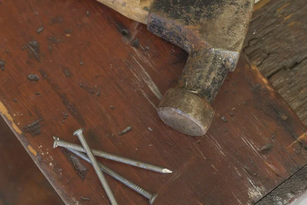 Three Nails and Hammer — Stock Photo, Image