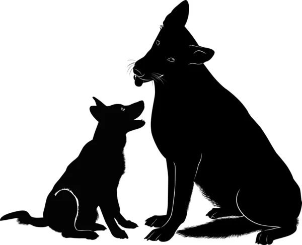 Black dogs silhouettes — Stock Vector