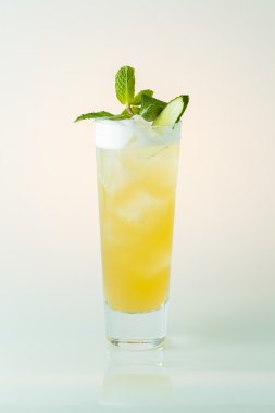 Tropical cocktail yellow in the glass clipart