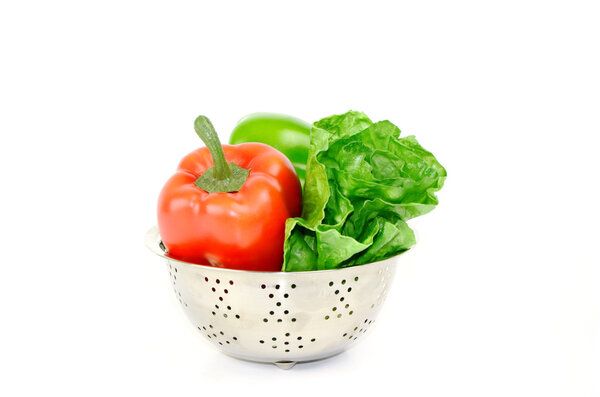 Colander with pepper and lettuce