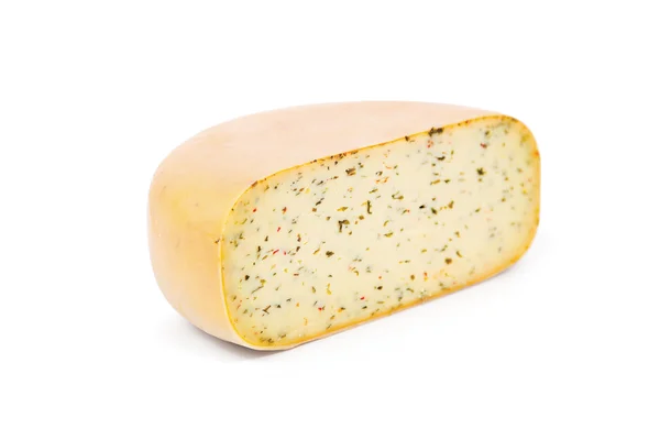 Gran pedazo de queso sobre fondo blanco —  Fotos de Stock