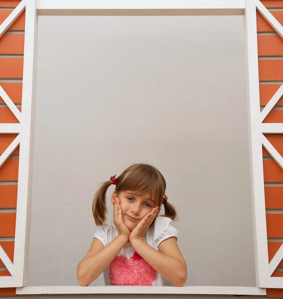 Kid in window — Stock Photo, Image