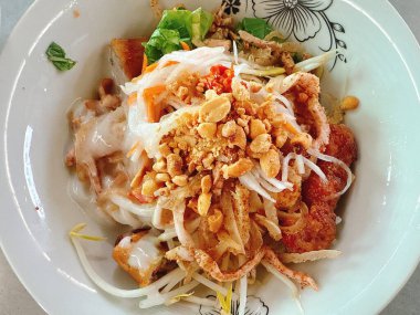 Delicious Vietnamese spring rolls with grilled meat fresh herbs rice noodles and dipping sauce traditional Asian cuisine vibrant street food healthy and flavorful authentic meal presentation