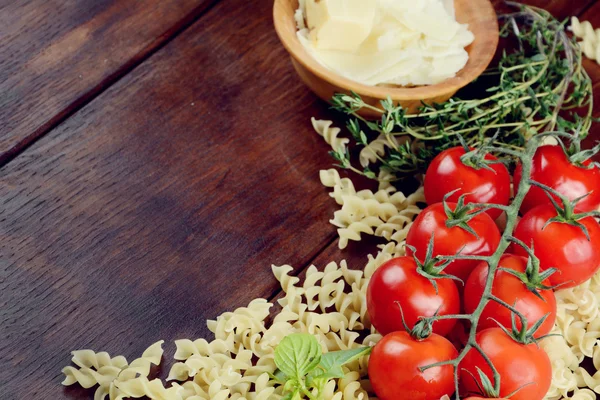 Raw fusilli pasta background — Stock Photo, Image