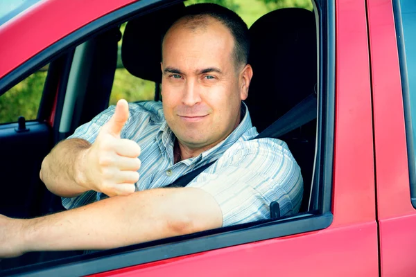 Adult man in his car — Stock Photo, Image
