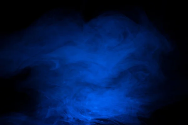 Blue smoke on a dark background — Stock Photo, Image