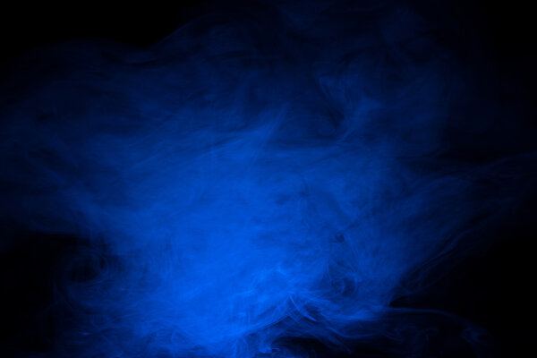 Blue smoke on a dark background