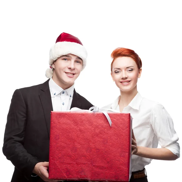 Uomini d'affari Santa hat holding present — Foto Stock