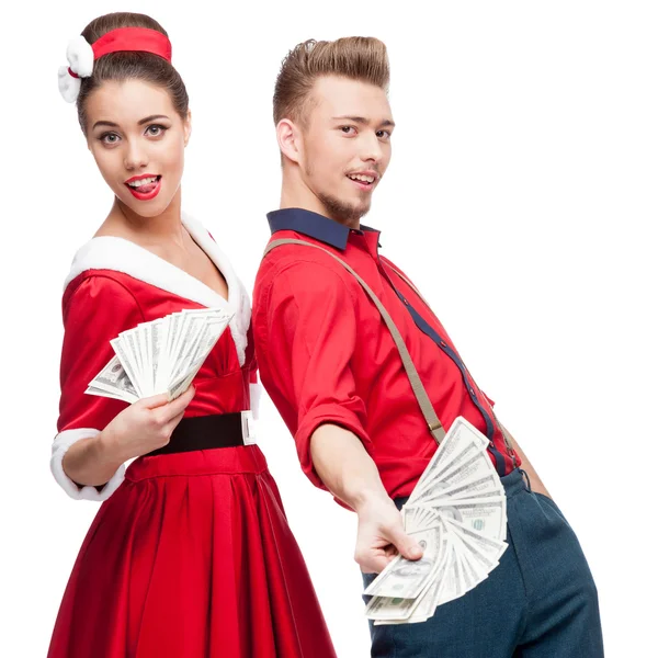 Young retro couple holding money — Stock Photo, Image