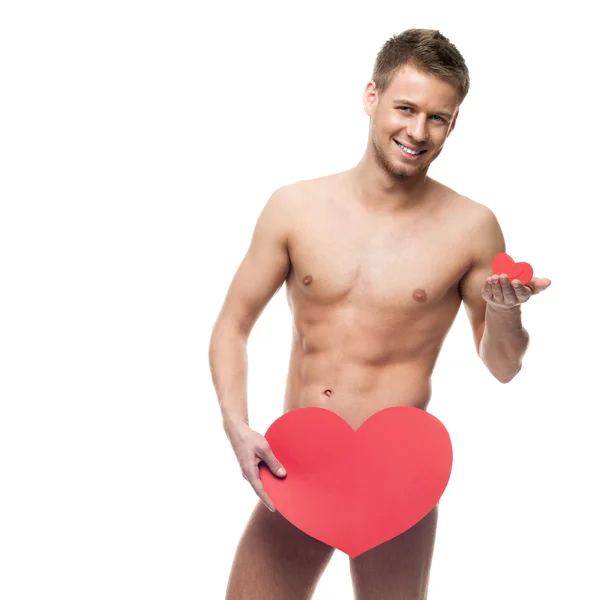 Funny naked man holding big red paper heart — Stock Photo, Image