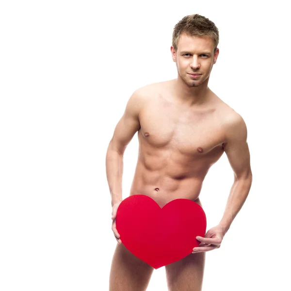 Funny naked man holding big red paper heart — Stock Photo, Image