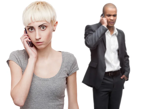 Worried business people calling by mobile telephone — Stock Photo, Image