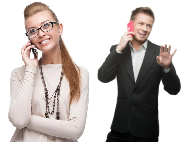 Happy smiling business people calling by mobile telephone — Stock Photo, Image